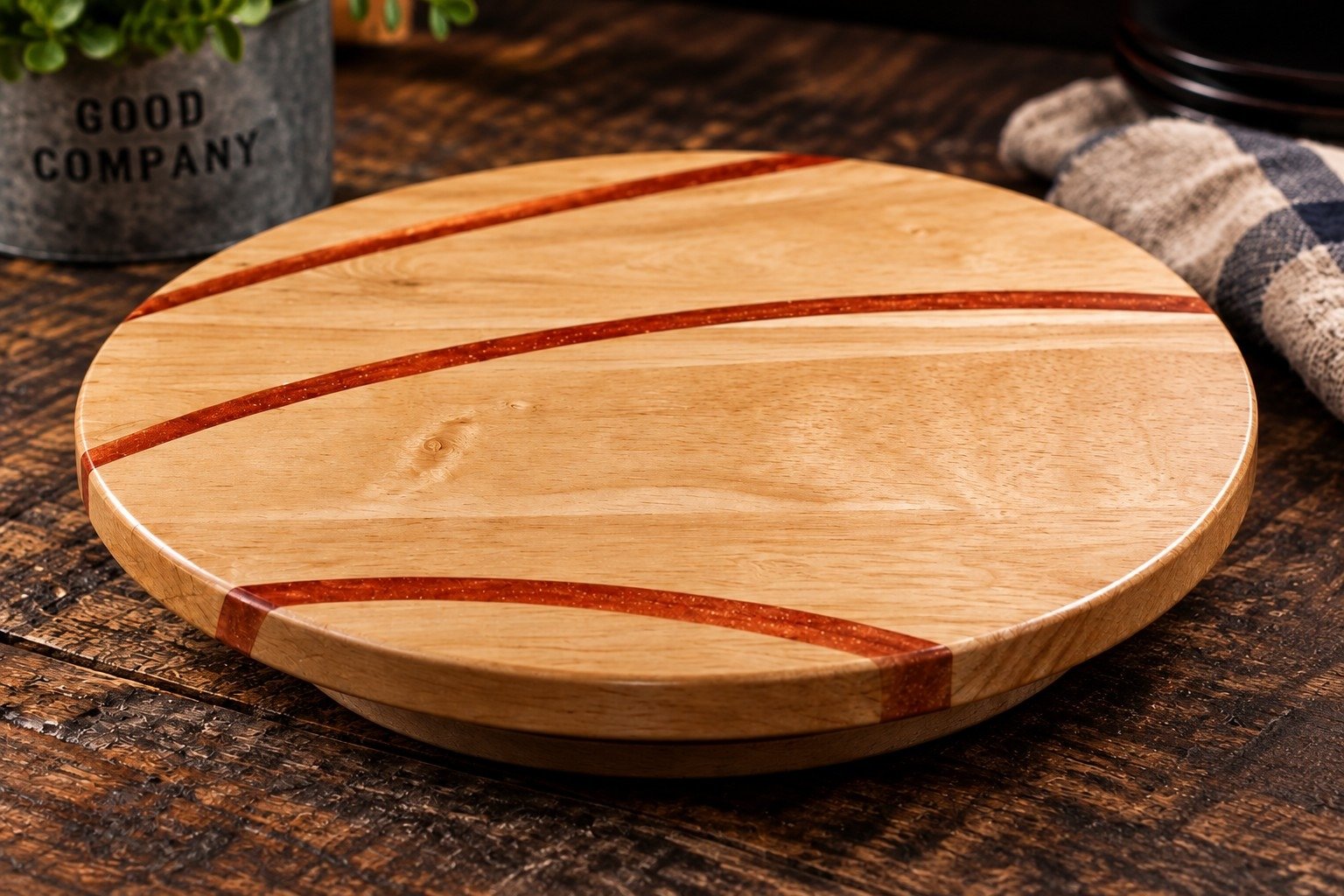 Round wooden home-goods piece with resin accents